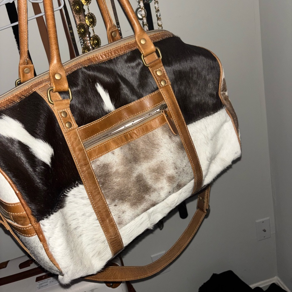 Cowhide duffle bag